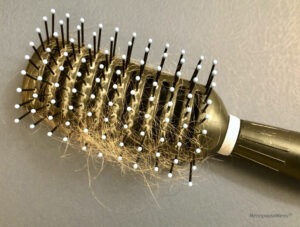 Hairbrush with loose hairs